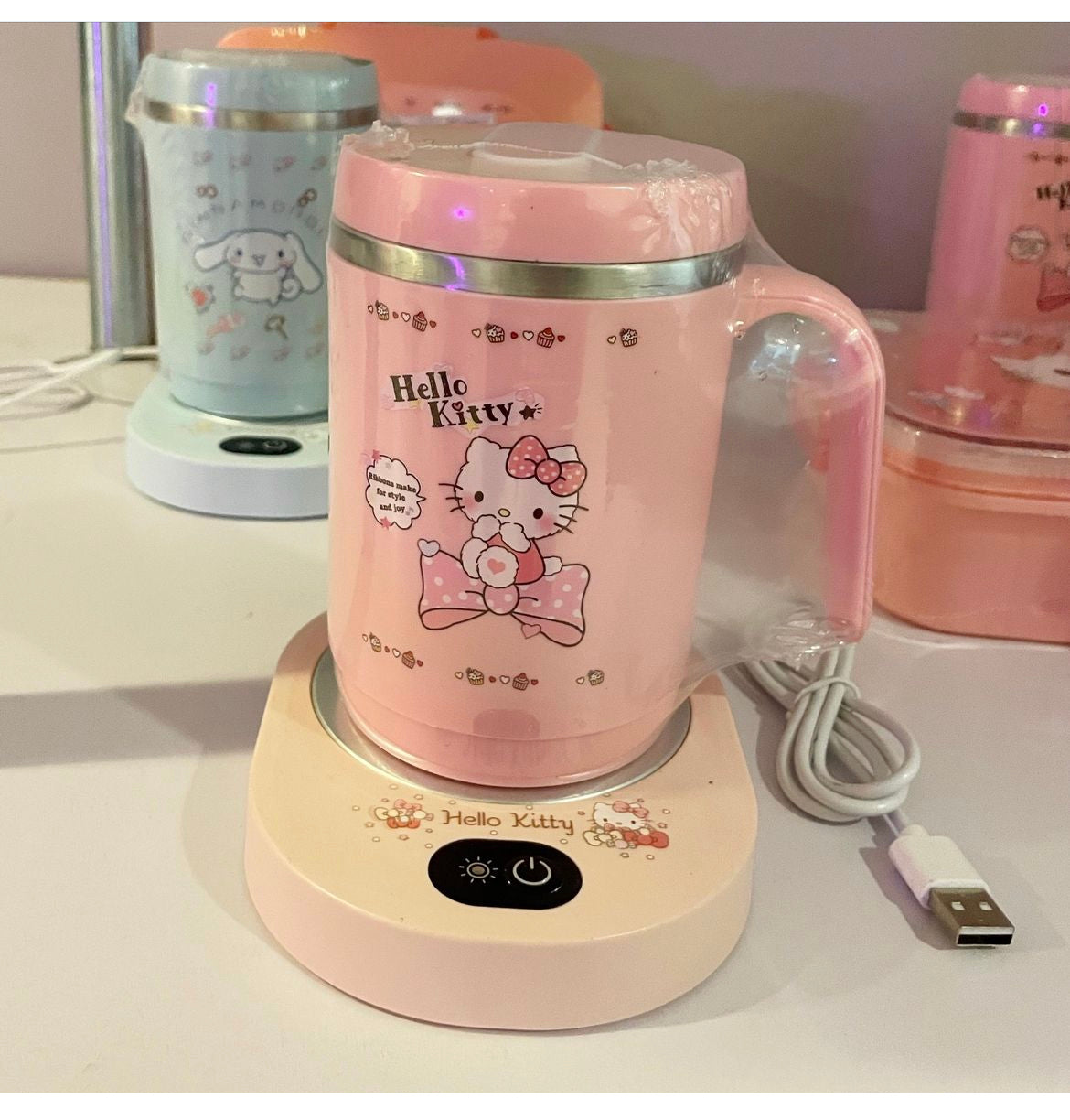 Hello kitty mug + mug warmer